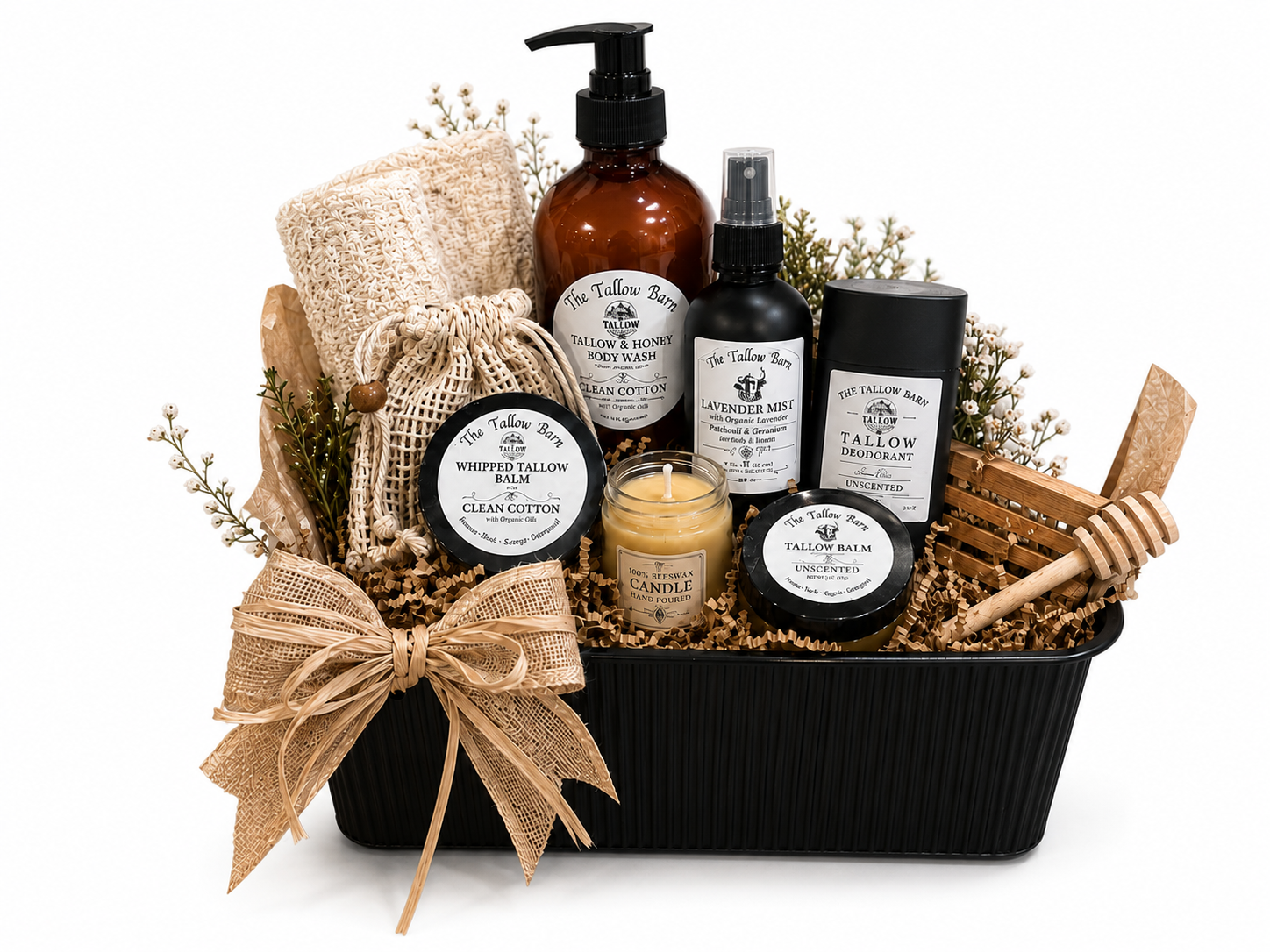 A curated The Tallow Barn gift set with balms, bottles, and natural wrapping.